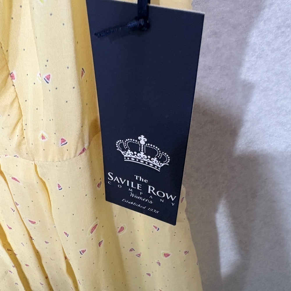 The Savile Row Dress This is a beautiful yellow dress with small print. - Picture 3 of 4